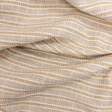 Close-up of Sailor Sisal upholstery fabric in warm neutral tones with a textured woven stripe pattern