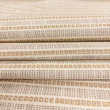 Close-up of Sailor Sisal upholstery fabric in warm neutral tones with a textured woven stripe pattern