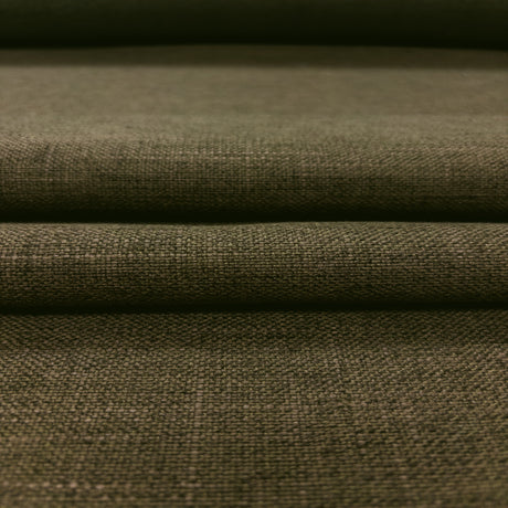 Close-up of olive green fabric with a textured pattern