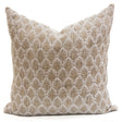 Textured throw pillow with golden leaf-chevron pattern on ivory base. Cozy decorative pillow for fall or neutral styling.