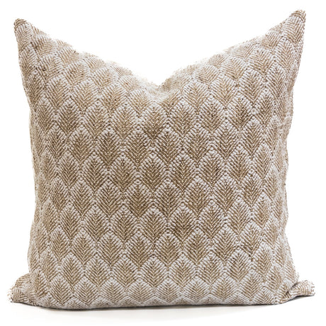 Textured throw pillow with golden leaf-chevron pattern on ivory base. Cozy decorative pillow for fall or neutral styling.
