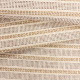 Close-up of Sailor Sisal upholstery fabric in warm neutral tones with a textured woven stripe pattern