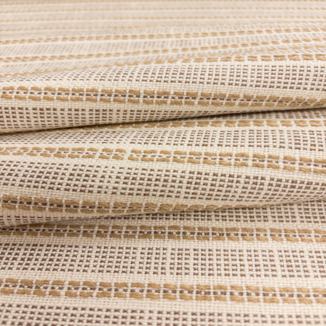 Close-up of Sailor Sisal fabric in warm neutral tones with a textured woven stripe pattern